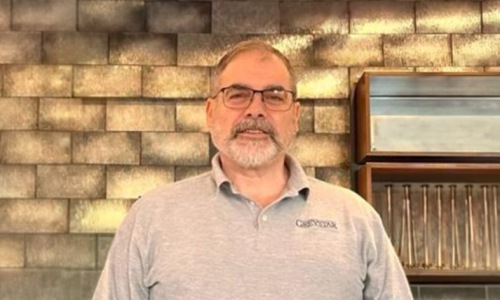 a staff member standing outside